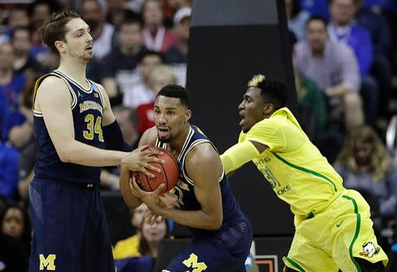 Mark Donnal (34) and Zak Irvin (21)