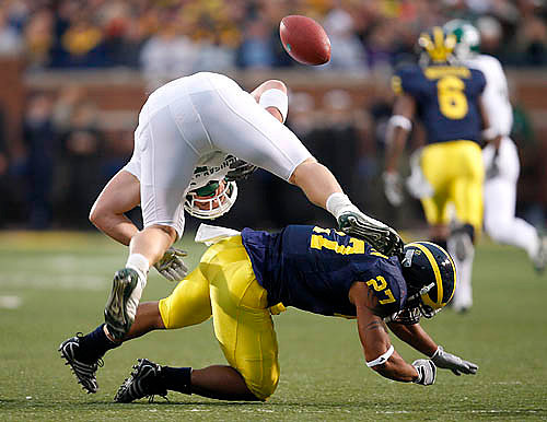 Brandon Harrison (27) and Donovan Warren (6)