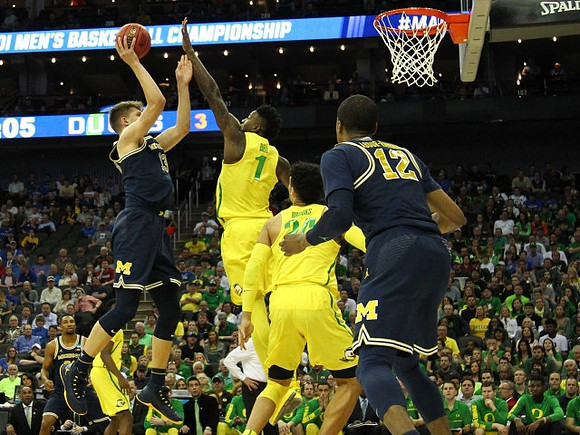 Zak Irvin (21), Moritz Wagner (13), and Muhammad-Ali Abdur-Rahkman (12)