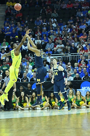 Zak Irvin (21) and Mark Donnal (34)