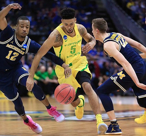 Muhammad-Ali Abdur-Rahkman (12) and Duncan Robinson (22)