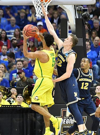 Duncan Robinson (22) and Muhammad-Ali Abdur-Rahkman (12)