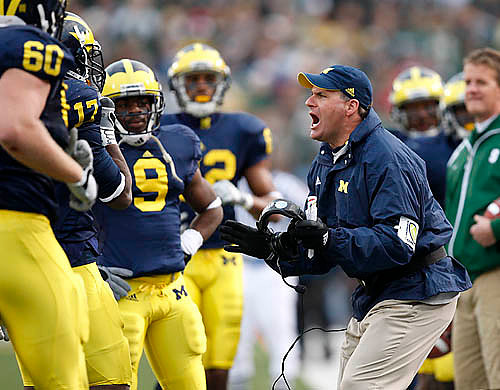 David Moosman (60), Toney Clemons (17), Martavious Odoms (9), and Rich Rodriguez