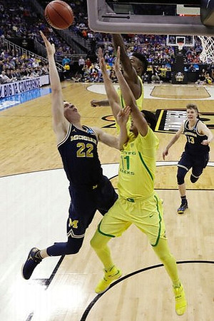Duncan Robinson (22) and Moritz Wagner (13)