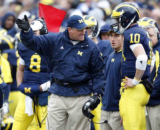 Nick Sheridan (8), Rich Rodriguez, and Steven Threet (10)