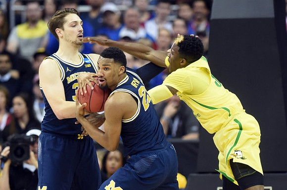 Mark Donnal (34) and Zak Irvin (21)