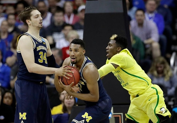 Mark Donnal (34) and Zak Irvin (21)