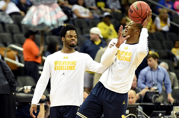Derrick Walton Jr. (10) and Muhammad-Ali Abdur-Rahkman (12)