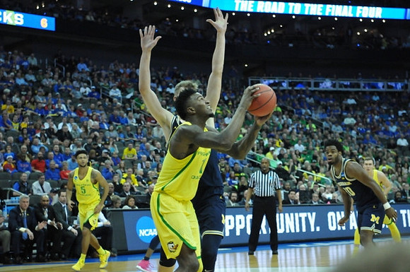 Moritz Wagner (13) and Derrick Walton Jr. (10)