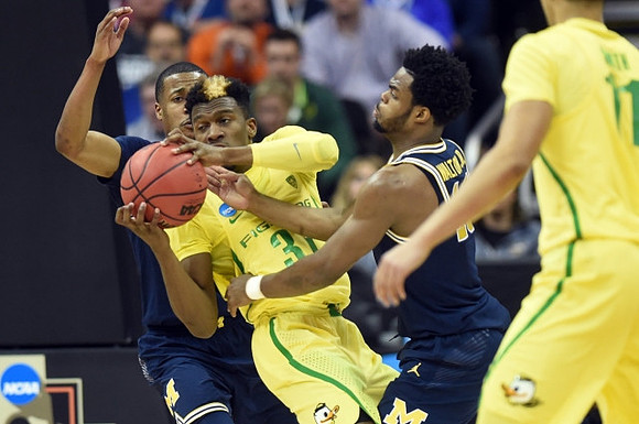 Muhammad-Ali Abdur-Rahkman (12) and Derrick Walton Jr. (10)