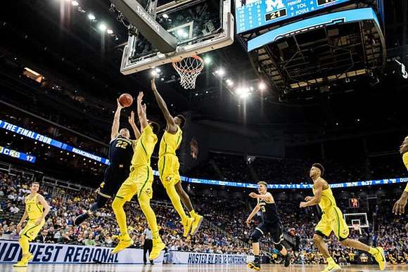 Duncan Robinson (22) and Moritz Wagner (13)