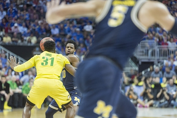 Derrick Walton Jr. (10) and D.J. Wilson (5)
