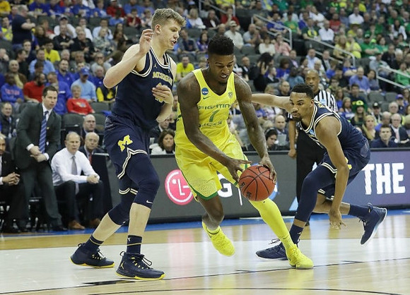 Moritz Wagner (13) and Zak Irvin (21)