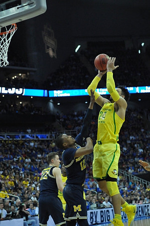 Duncan Robinson (22) and Muhammad-Ali Abdur-Rahkman (12)