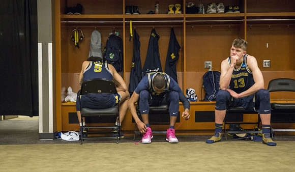 D.J. Wilson (5), Muhammad-Ali Abdur-Rahkman (12), and Moritz Wagner (13)