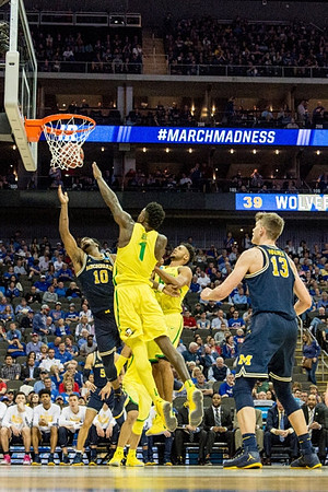 Derrick Walton Jr. (10) and Moritz Wagner (13)