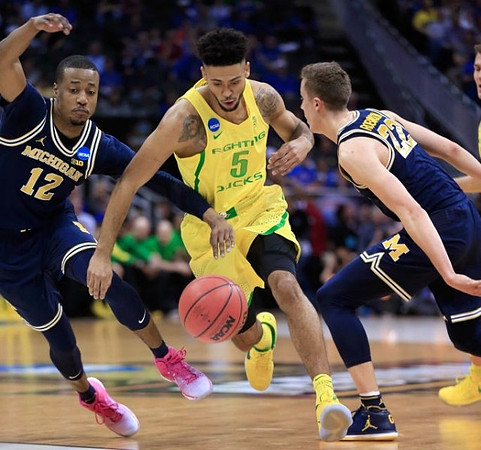 Muhammad-Ali Abdur-Rahkman (12) and Duncan Robinson (22)