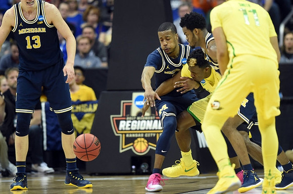 Moritz Wagner (13), Muhammad-Ali Abdur-Rahkman (12), and Derrick Walton Jr. (10)