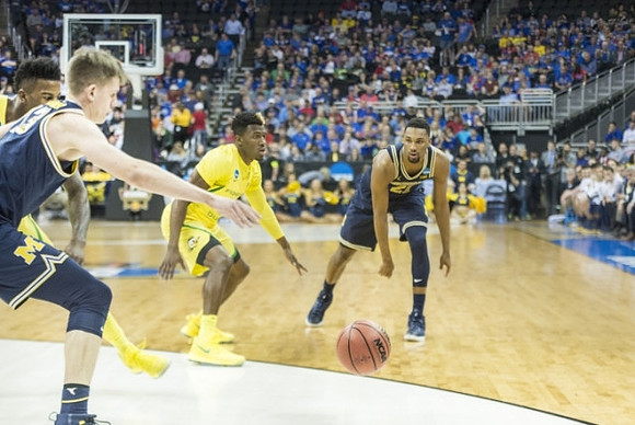 Moritz Wagner (13) and Zak Irvin (21)