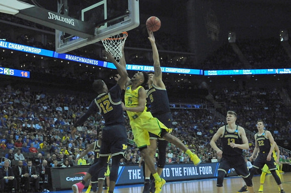 Derrick Walton Jr. (10), Muhammad-Ali Abdur-Rahkman (12), D.J. Wilson (5), Moritz Wagner (13), and Duncan Robinson (22)