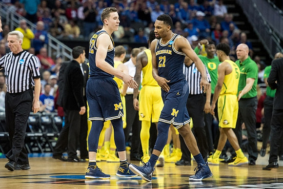 Duncan Robinson (22) and Zak Irvin (21)