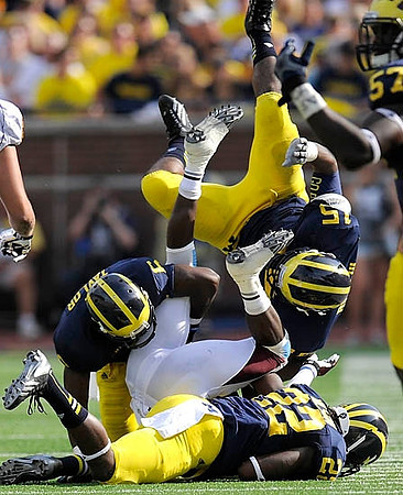 Raymon Taylor (6), Jarrod Wilson (22), James Ross (15), and Frank Clark (57)