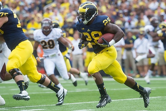 Michael Schofield (75) and Fitzgerald Toussaint (28)