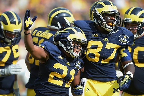 Michael Schofield (75), Graham Glasgow (61), Jeremy Gallon (21), Devin Funchess (87), and Jack Miller (60)