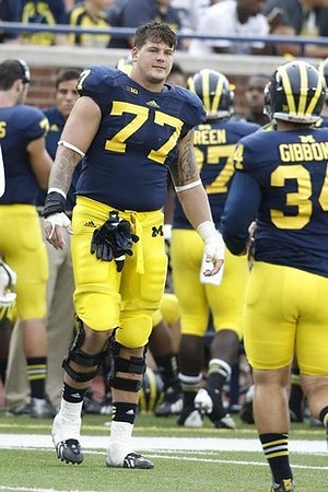 Taylor Lewan (77) and Brendan Gibbons (34)