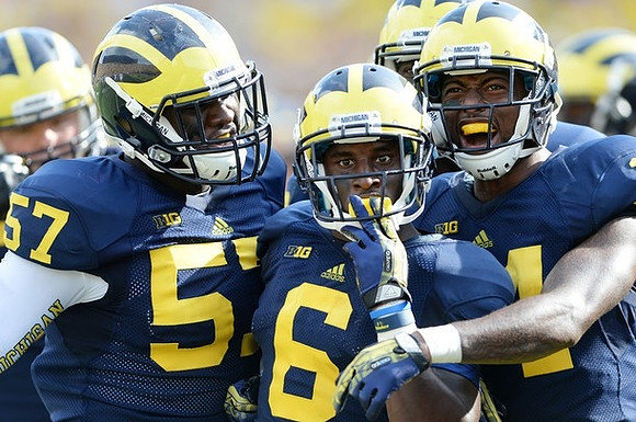 Frank Clark (57), Raymon Taylor (6), and Cameron Gordon (4)