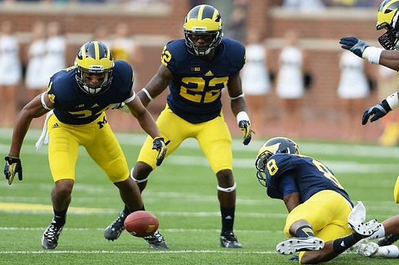 Delonte Hollowell (24), Jarrod Wilson (22), and Channing Stribling (8)