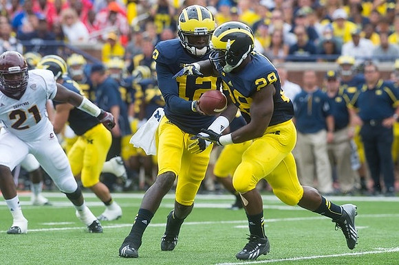 Devin Gardner (12) and Fitzgerald Toussaint (28)