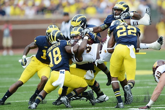 Josh Furman (14), Blake Countess (18), and Jarrod Wilson (22)