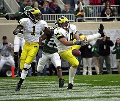 Andy Mignery (14) and Braylon Edwards (1)