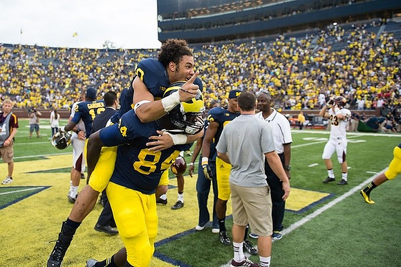 Devin Gardner (12), A.J. Williams (84), and Drake Johnson (20)