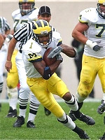 Braylon Edwards (1) and David Baas (75)