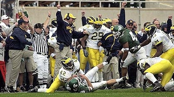 Lawrence Reid (42), Larry Stevens (13), Lloyd Carr, and Ernest Shazor (25)