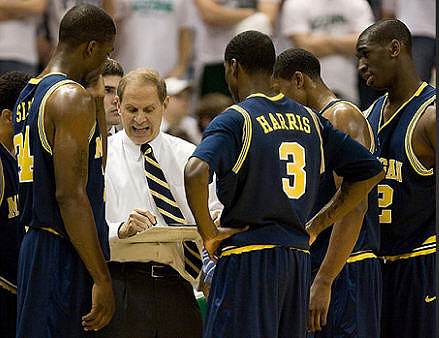 DeShawn Sims, John Beilein, and Manny Harris
