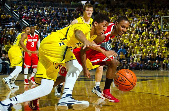 Zak Irvin (21), Aubrey Dawkins (24), and Spike Albrecht (2)