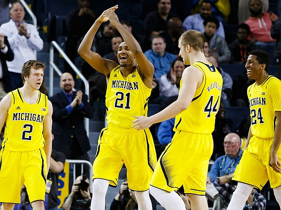 Spike Albrecht (2), Zak Irvin (21), Max Bielfeldt (44), and Aubrey Dawkins (24)