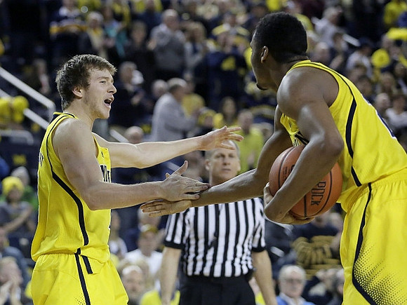 Spike Albrecht (2) and Zak Irvin (21)