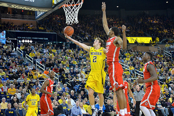 Muhammad-Ali Abdur-Rahkman (12) and Spike Albrecht (2)