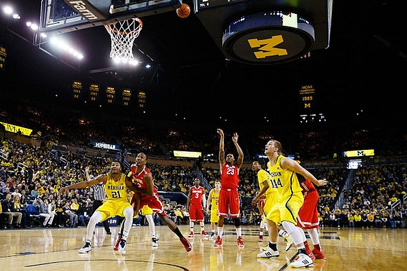 Zak Irvin (21), Spike Albrecht (2), Muhammad-Ali Abdur-Rahkman (12), and Max Bielfeldt (44)