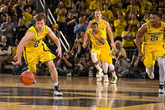 Spike Albrecht (2), Muhammad-Ali Abdur-Rahkman (12), Max Bielfeldt (44), and Zak Irvin (21)