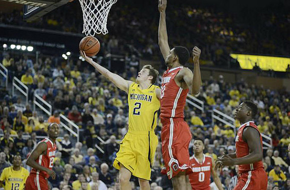 Muhammad-Ali Abdur-Rahkman (12) and Spike Albrecht (2)