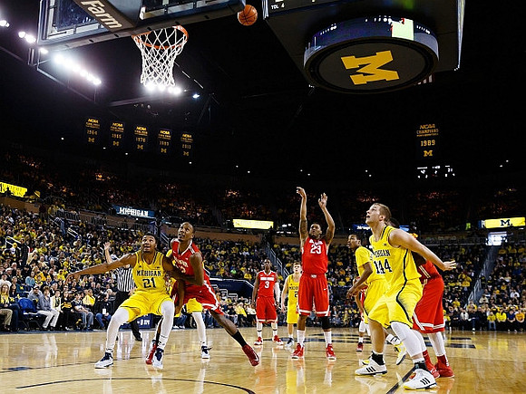 Zak Irvin (21), Spike Albrecht (2), Muhammad-Ali Abdur-Rahkman (12), and Max Bielfeldt (44)