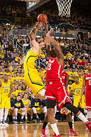 Zak Irvin (21), Max Bielfeldt (44), and Muhammad-Ali Abdur-Rahkman (12)
