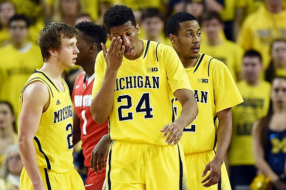 Spike Albrecht (2), Aubrey Dawkins (24), and Muhammad-Ali Abdur-Rahkman (12)