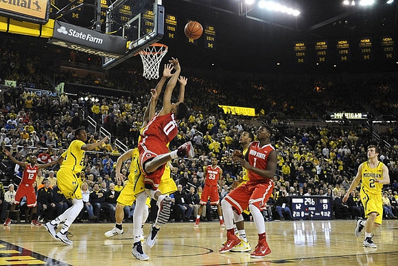 Aubrey Dawkins (24) and Spike Albrecht (2)