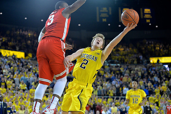 Spike Albrecht (2) and Muhammad-Ali Abdur-Rahkman (12)